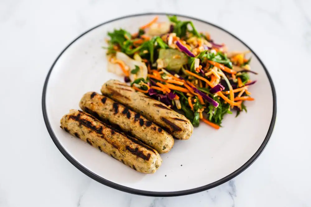 vegan sausages with fresh side salad, healthy plant-based food recipes