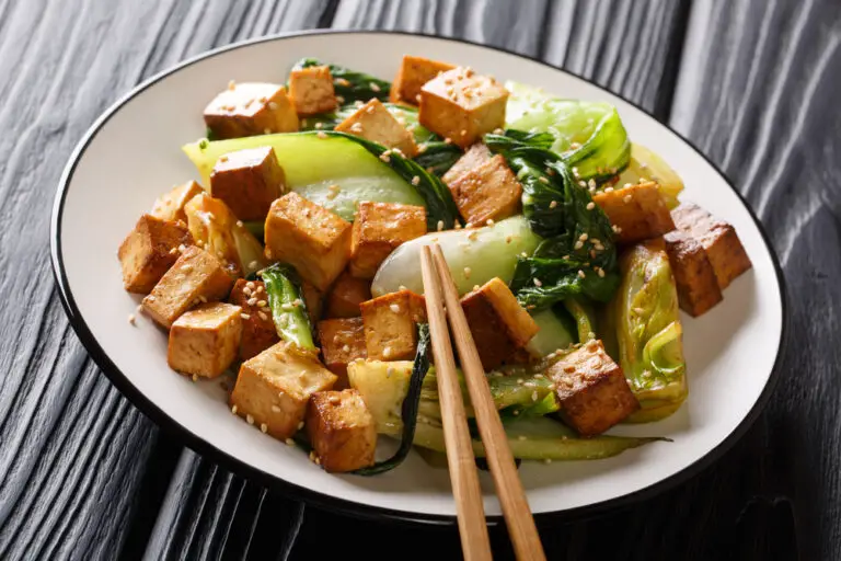 Veggie fried tofu with baby bok choy, soy sauce and sesame seeds