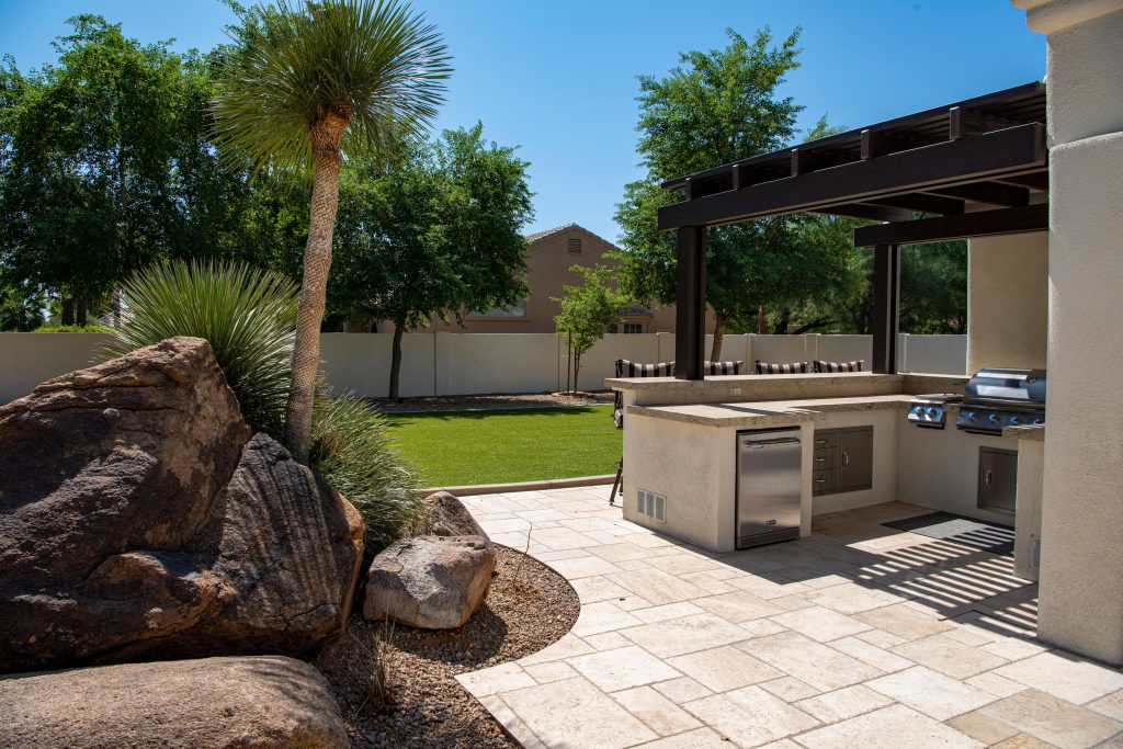 Protecting Your Patio: Why You Need to Trim Trees Around Your Outdoor Kitchen